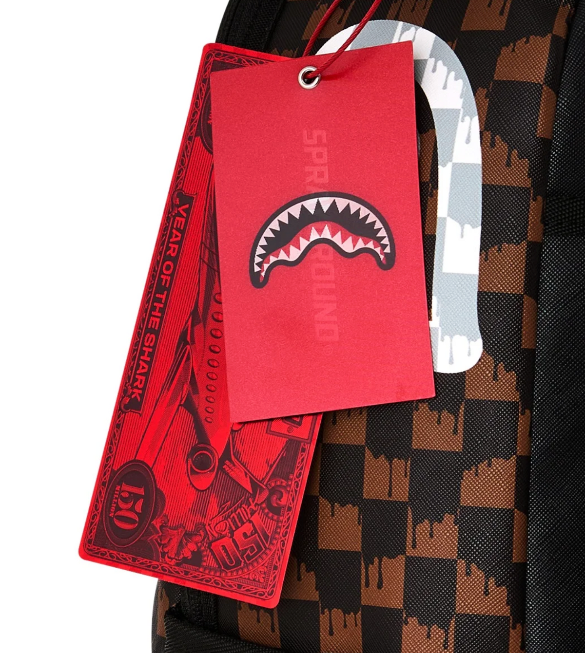 Zaino Sprayground "Drip Checker" a Scacchi Marroni con Shark Mouth Bianca – Edizione Limitata